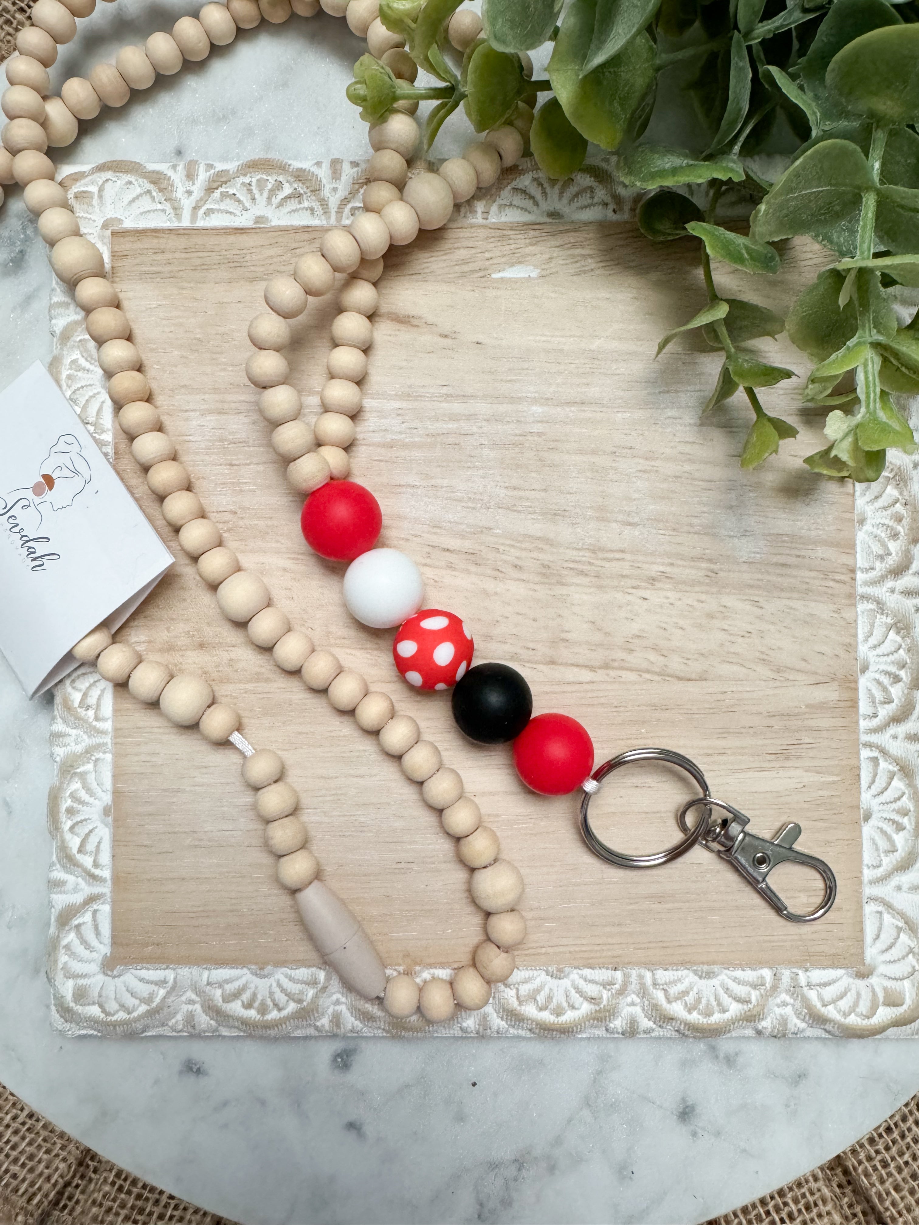 Red and black wooden bead lanyard